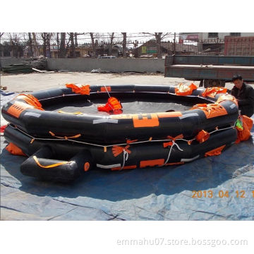 Both sides of reversible inflatable life raft with cradle for inland river